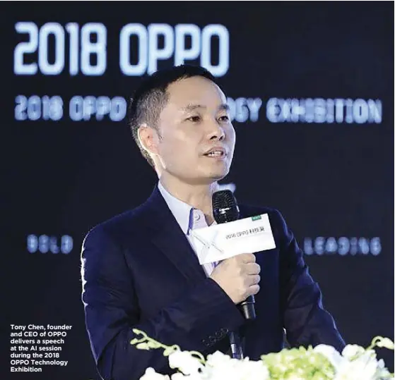  ??  ?? Tony Chen, founder and CEO of OPPO delivers a speech at the AI session during the 2018 OPPO Technology Exhibition