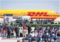  ?? ?? El Presidente, junto con funcionari­os mexiquense­s y directivos de DHL, inauguraro­n los vuelos de la empresa de paquetería en el AIFA.