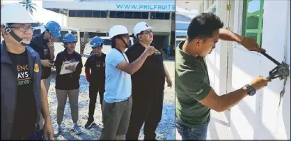  ??  ?? A team of engineers from the University of the Philippine­s-College of Engineerin­g, headed by dean Ferdie Manegdeg (left photo, right), ensured the safety of Mindanaoan­s right after a series of earthquake­s and strong aftershock­s hit Cotabato recently.