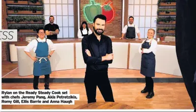  ??  ?? Rylan on the Ready Steady Cook set with chefs Jeremy Pang, Akis Petretziki­s, Romy Gill, Ellis Barrie and Anna Haugh