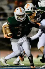  ?? PHOTO FOR THE RECORDER BY DONNIE ZIMMERMAN ?? Lisandro Martinez runs with the football for the Portervill­e High football team against Golden Valley on Thursday at Rankin Stadium.