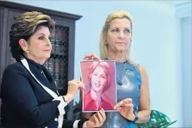  ?? Frederic J. Brown AFP/Getty Images ?? ATTORNEY Gloria Allred, left, at a news conference with a woman named Robin, who alleges she was sexually assaulted by Roman Polanski when she was 16.