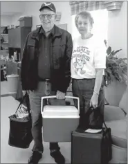  ?? LYNN KUTTER
ENTERPRISE-LEADER ?? Freeman and Sylvia Bentley prepare to deliver Meals on Wheels on Monday for the Prairie Grove Senior Center. They recently were inducted into the Senior Arkansas Hall of Fame.