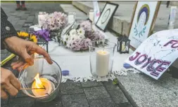  ?? DAVE SIDAWAY ?? Health workers held a vigil at Place du Canada on Wednesday in memory of Joyce Echaquan, an Atikamekw woman who died in the Joliette hospital two years ago.