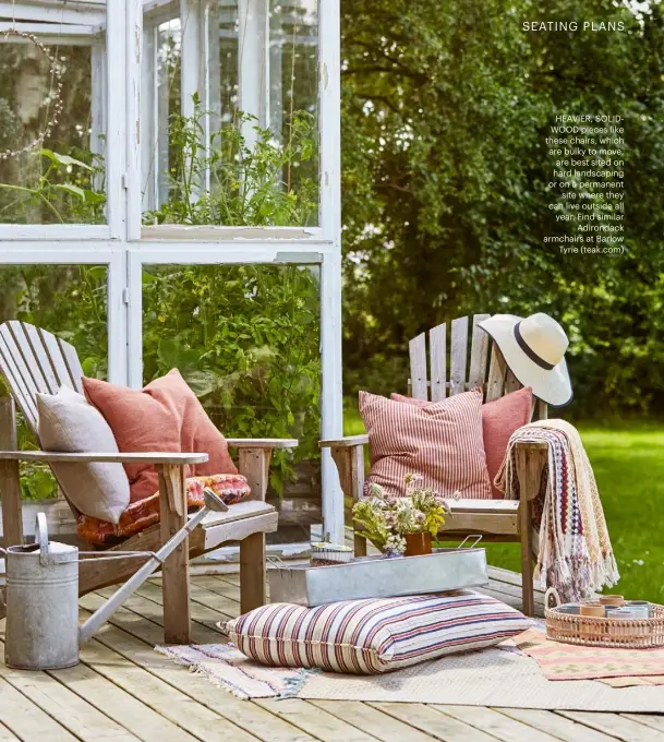  ??  ?? HEAVIER, SOLIDWOOD pieces like these chairs, which are bulky to move, are best sited on hard landscapin­g or on a permanent site where they can live outside all year. Find similar Adirondack armchairs at Barlow Tyrie (teak.com)