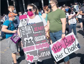  ?? MANDEL NGAN/GETTY-AFP ?? Protesters take part in the Women’s March and Rally for Abortion Justice on Saturday in Washington, D.C., as the abortion rights battle took to the streets.