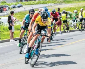  ??  ?? right
Zukowsky rides in the leader’s jersey at the 2019 Tour de Beauce