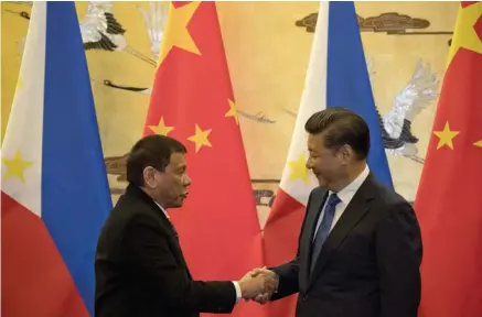  ?? AFP ?? Líder chinês Xi Jinping apoia os esforços do Governo filipino na luta contra o tráfico de drogas e criminalid­ade bem como o terrorismo