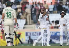  ?? AFP ?? India’s Mohammed Shami celebrates the wicket of South Africa captain Faf du Plessis on Day 3 of the third Test in Ranchi