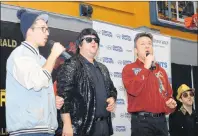  ?? JOE GIBBONS/THE TELEGRAM ?? From left, Keith Power delivers a little standup comedy, Darin Martin portrays Roy Orboson, Peter Halley portrays Neil Diamond and Evan Smith portrays Elton John at the launch of the 36th annual Frosty Festival on Thursday.