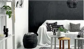  ??  ?? Resene advises teaming your favourite dark colour with a lighter neutral and good lighting to keep a smaller room feeling spacious.