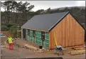  ??  ?? Constructi­on of the new eco-homes on the Island of Rum is under way