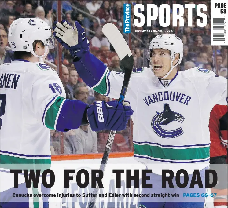  ?? — AP ?? Adam Cracknell of the Vancouver Canucks celebrates with Jake Virtanen, left, who opened the scoring in a 2-1 win over the Coyotes on Wednesday in Glendale, Ariz.