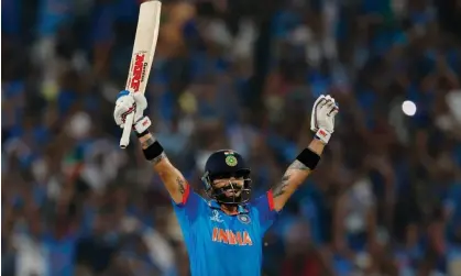  ?? ?? India’s Virat Kohli celebrates reaching his century and winning the match. Photograph: Adnan Abidi/Reuters