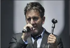  ?? YUI MOK — PA VIA AP FILE ?? Musician Terry Hall of The Specials performs on the main stage at the Isle of Wight Festival in Seaclose Park, Newport, Isle of Wight, England, on June 14, 2014.