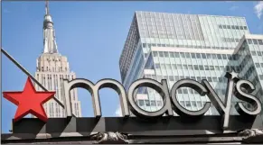  ?? (AP) ?? Macy’s corporate signage marks the chain’s flagship store in New York in this 2017 file photo. Macy’s said that it earned $286 million, or 98 cents per share, for the three-month period that ended April 30.