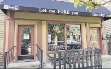  ??  ?? Exterior view of Lark St. Poke Bar in Albany.