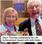  ?? ?? Gwyn Thomas celebratin­g his Life Achievemen­t Award with wife Helen