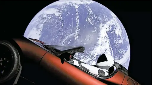  ?? PICTURE: SPACEX ?? ROAD TO NOWHERE: This image from video provided by SpaceX shows the company’s spacesuit in Elon Musk’s red Tesla sports car which was launched into space during the first test flight of the Falcon Heavy rocket on Tuesday.