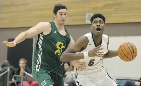  ?? CHRISTINNE MUSCHI FOR NATIONAL POST ?? Quincy Guerrier, right, had never heard of Thetford Mines when he joined its team. “I thought it was in the U.S.,” he says.