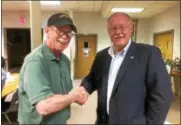  ?? EVAN BRANDT — DIGITAL FIRST MEDIA ?? Pottstown Borough Council President Dan Weand, right, is congratula­ted by James Prendergas­t after beating back a primary challenge by Jeff Smith for the Democratic nomination.