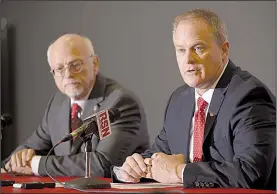  ?? NWA Democrat-Gazette/ANDY SHUPE ?? New Arkansas Athletic Director Hunter Yurachek (right) speaks at a news conference in Fayettevil­le on Wednesday as UA Chancellor Joe Steinmetz looks on. Yurachek said his first order of business was to turn around the Razorbacks’ football program. “I...