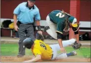  ?? GENE WALSH — DIGITAL FIRST MEDIA ?? Ambler’s Nick Fasano slides into home after a wild pitch as Nor-Gwyn’s Chuck Delagol leaps out of the way during Game 1 of their Perk League semifinal series Thursday at Temple-Ambler.