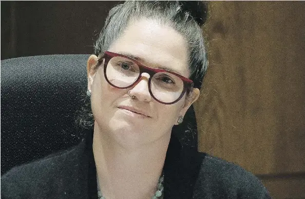  ?? LARRY WONG ?? Public school trustee Bridget Stirling introduced a motion at the school board meeting on Tuesday reaffirmin­g the board’s commitment to protect LGBTQ students, reinforcin­g the existing policy that staff will not out students to their parents or...