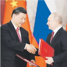  ?? Vladimir astapkovic­h, sputnik, kremlin pool photo vía ap ?? Al término de sus negociacio­nes, Xi y Putin declararon que China y Rusia no son aliados político-militares al estilo de la Guerra Fría.