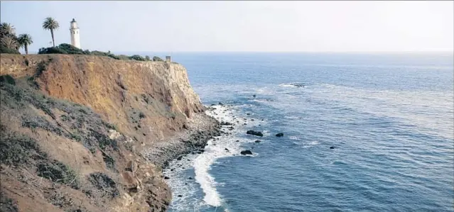  ?? Francine Orr Los Angeles Times ?? THE AREA OF the Point Vicente Lighthouse is a reminder of Rancho Palos Verdes’ ocean ties. And although it may seem a world away, the city is accessible to L.A.