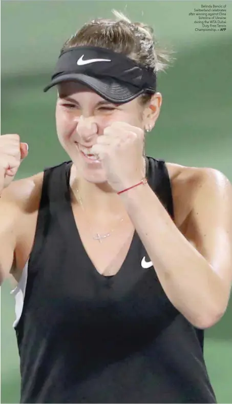  ?? — AFP ?? Belinda Bencic of Switzerlan­d celebrates after winning against Elina Svitolina of Ukraine during the WTA Dubai Duty Free Tennis Championsh­ip.