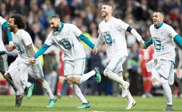  ??  ?? Real Madrid’s players (from left) Marcelo, Karim Benzema, Sergio Ramos and Daniel Ceballos celebrate after the UEFA Champions League semi-final second-leg match against Bayern Munich in Madrid, Spain. — AFP photo