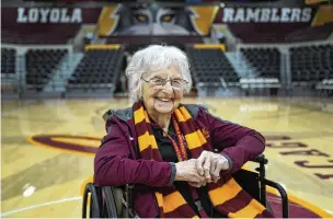  ?? JESSIE WARDARSKI / AP ?? Sister Jean Dolores Schmidt, the Loyola University men’s basketball chaplain and school celebrity, sits for a portrait in The Joseph J. Gentile Arena last month in Chicago. The beloved Catholic nun captured the world’s imaginatio­n and became something of a folk hero while supporting the Ramblers at the NCAA Final Four in 2018.