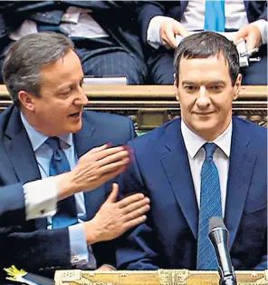  ??  ?? George Osborne is congratula­ted by David Cameron after his Budget speech. His package of cuts for welfare and tax breaks for the middle classes angered Iain Duncan Smith