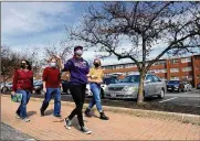  ?? FRED SQUILLANTE / COLUMBUS DISPATCH ?? Kess Cline (right), 16, and her parents, Kathy and James, listen as Autumn Westbrook gives them a tour of Capital University. Some aspects of these tours look a little different these days due to COVID-19.