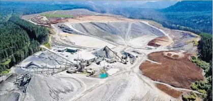  ?? Polaris Materials ?? ON CANADA’S Vancouver Island, rocks and sand are scraped from a quarry and sorted for shipping to distant building sites.