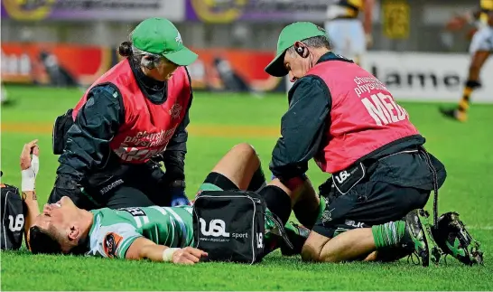  ?? PHOTO: PHOTOSPORT ?? Otere Black moments after he went down with a knee injury late in the first half against Taranaki.