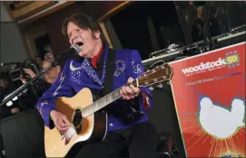  ?? PHOTO BY EVAN AGOSTINI — INVISION — AP, FILE ?? In this file photo, musician John Fogerty performs at the Woodstock 50 lineup announceme­nt at Electric Lady Studios in New York.