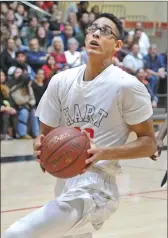  ?? Dan Watson/ The Signal (See additional photos on signalscv.com) ?? Hart forward Cameron Fuller eyes the basket during a game against Golden Valley on Jan. 22 at Hart High.