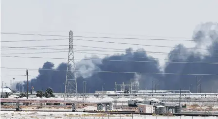  ?? STRINGER/REUTERS ?? Smoke is seen following a fire at Aramco facility in the eastern city of Abqaiq, Saudi Arabia, Saturday.