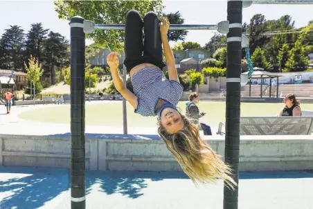  ?? Gabrielle Lurie / The Chronicle ?? Brooklynn Conway plays near Bayside Martin Luther King Jr. Academy, which sheÍll attend now that two schools are merging.