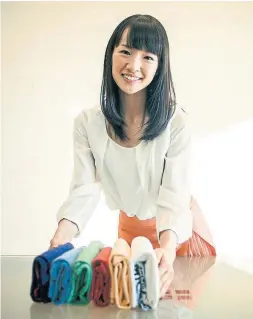  ?? MARIE TAKAHASHI THE WASHINGTON POST ?? Profession­al organizer Marie Kondo guides entire families, not just moms, into pitching in at home in the Netflix series Tidying Up With Marie Kondo.