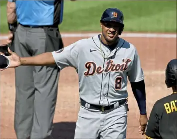  ?? Matt Freed/Post-Gazette ?? Tigers second baseman Jonathan Schoop crosses the plate for the go-ahead run against the Pirates in the eighth inning Sunday at PNC Park.