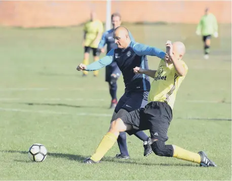  ??  ?? Sunderland Willow Pond (yellow) take on Doxy Lad in the Sunderland Over-40s league.