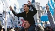  ?? RODRIGO ABD/AP ?? Supporters of Argentina’s Vice President Cristina Fernandez rally Friday in Buenos Aires, after she escaped an apparent assassinat­ion attempt the previous night.