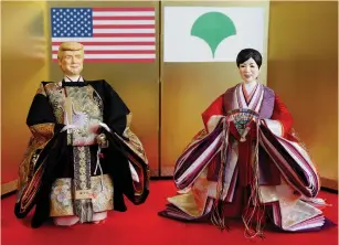  ?? (Toru Hanai/Reuters) ?? DOLL MAKER Kyugetsu’s dolls depicting US President Donald Trump and Tokyo Governor Yuriko Koike are pictured at the company’s main store in Tokyo yesterday.