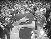  ?? Gregory Shamus Getty Images ?? STEPHEN CURRY hugs Kevin Durant after sweeping the Cleveland Cavaliers in the NBA Finals.