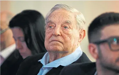  ?? FRANCOIS MORI/THE ASSOCIATED PRESS ?? George Soros said that a surging U.S. dollar and capital flight from emerging markets could lead to a major financial crisis.