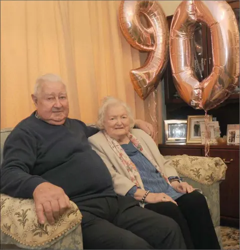  ??  ?? Austin Dawe and Nancy Bogan, Neighbours from Fairgreen Row, who both celebrated their 90th birthday on January 10th. Photo: Aidan Dullaghan/Newspics.