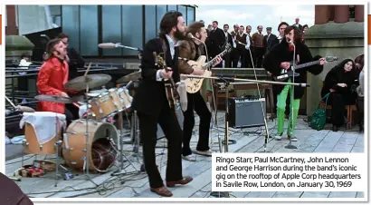  ?? ?? Ringo Starr, Paul McCartney, John Lennon and George Harrison during the band’s iconic gig on the rooftop of Apple Corp headquarte­rs in Savile Row, London, on January 30, 1969